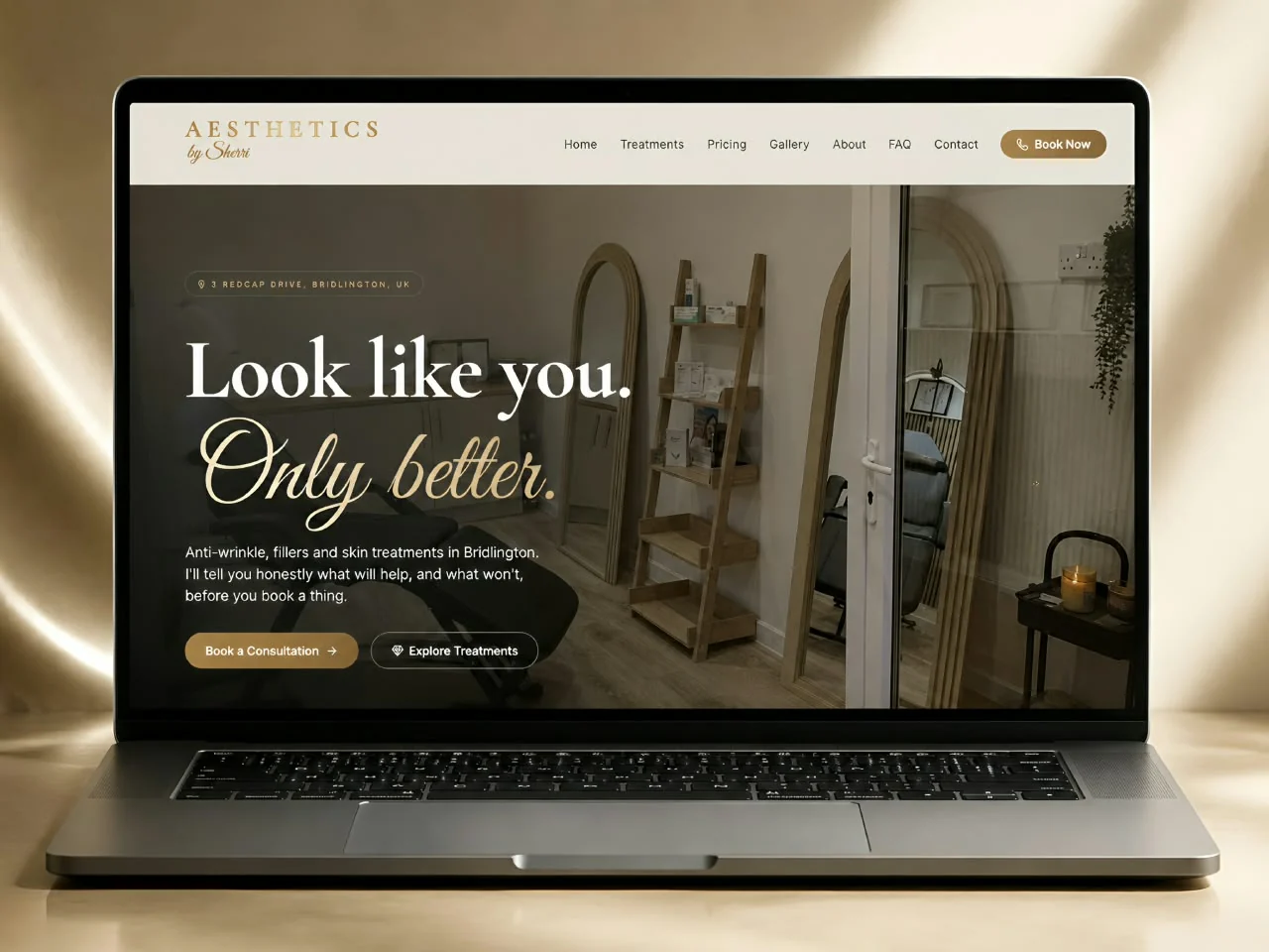 Aesthetics by Sherri clinic website presented on a laptop with its cream-and-gold identity